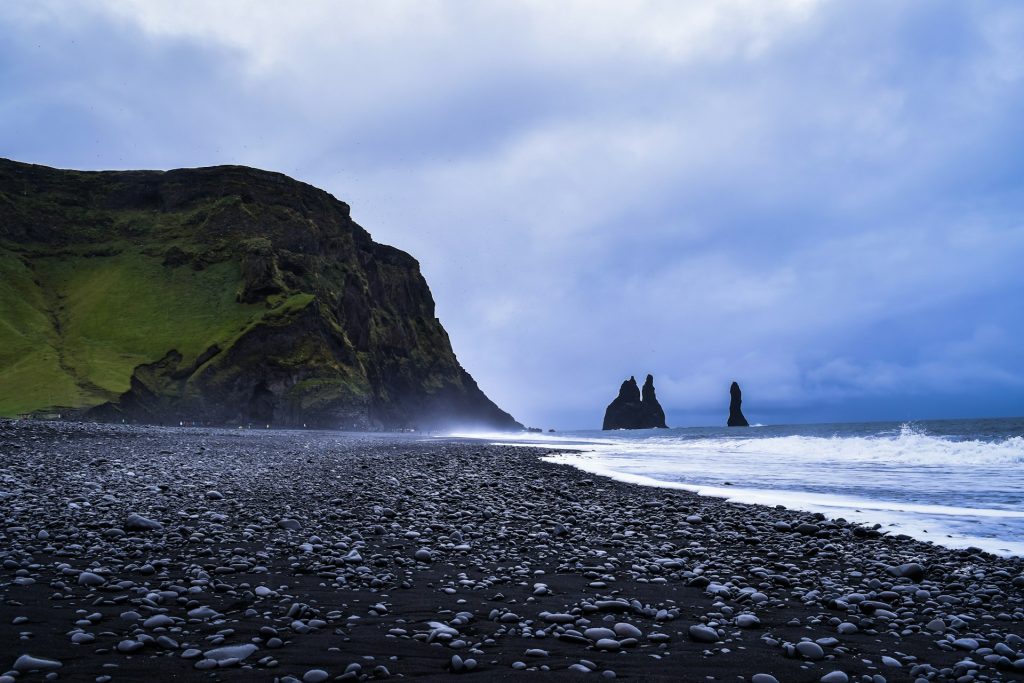 black sand beach sea  steaks are considered as trolls in iceland